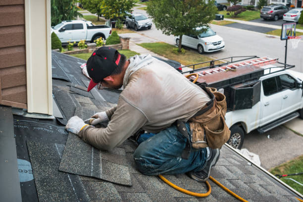 Professional Metal Roofing technician working in Monroe, MI